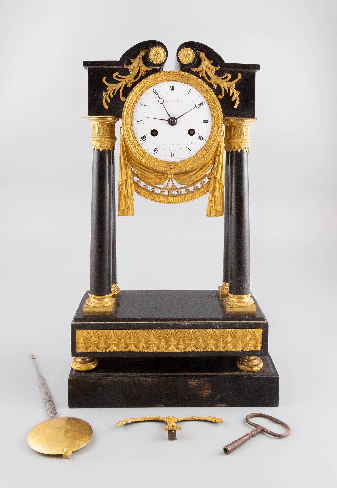 Null 
Louis XVI style clock in marble and gilt bronze. The movement signed TARAU&hellip;