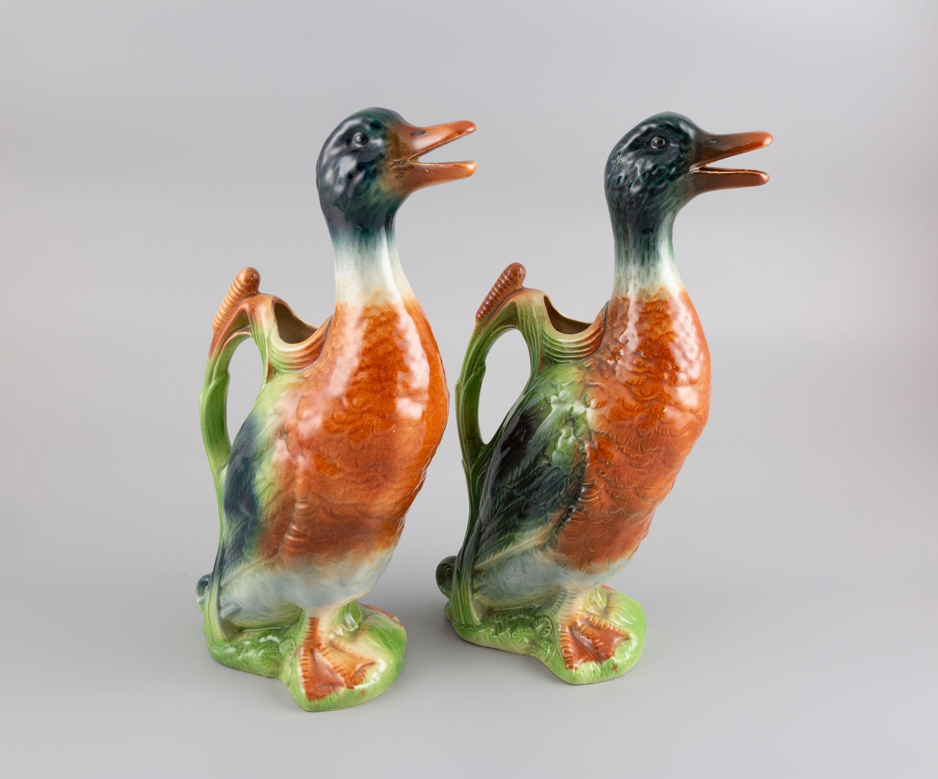 Null Pair of barbotine pourers representing ducks. H.34cm.