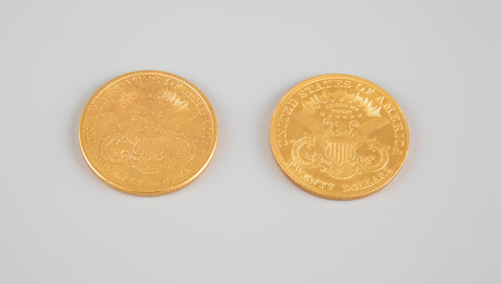 Null 
2件1897年和1900年的20美元黄金自由币。P:65.2g