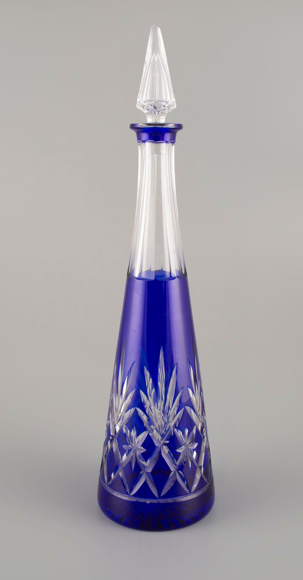 Null Crystal of Bohemia. Decanter and its blue cut crystal stopper.