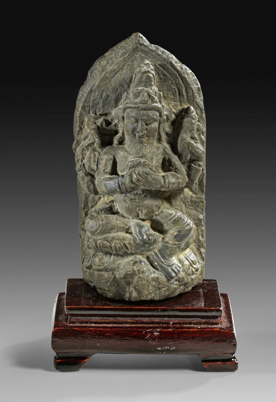 Altar figurine of Agni. Grey schist. Bearded, four-armed… | Drouot.com