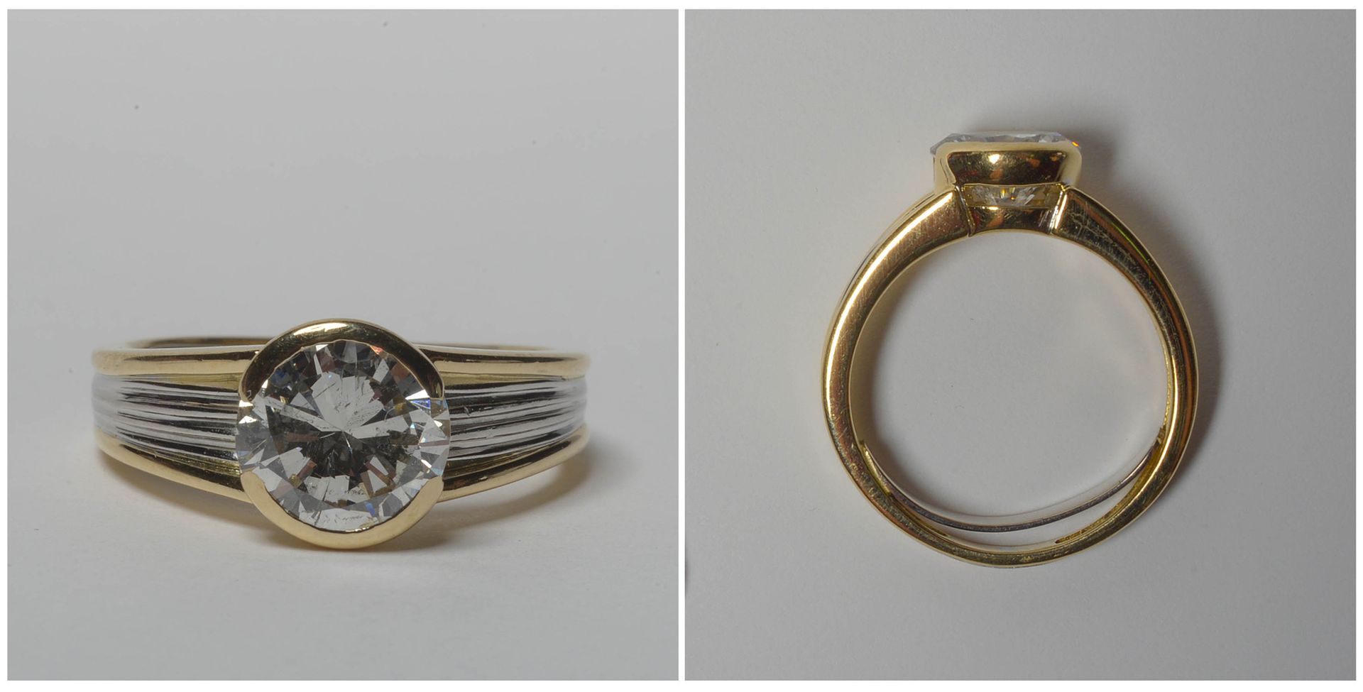 Null 18K黄金和白金戒指，镶嵌了一颗+/-1.60克拉的明亮型切割钻石（颜色：H；净度：P1）。手指（公制）：51。总重量：+/-5.9gr。