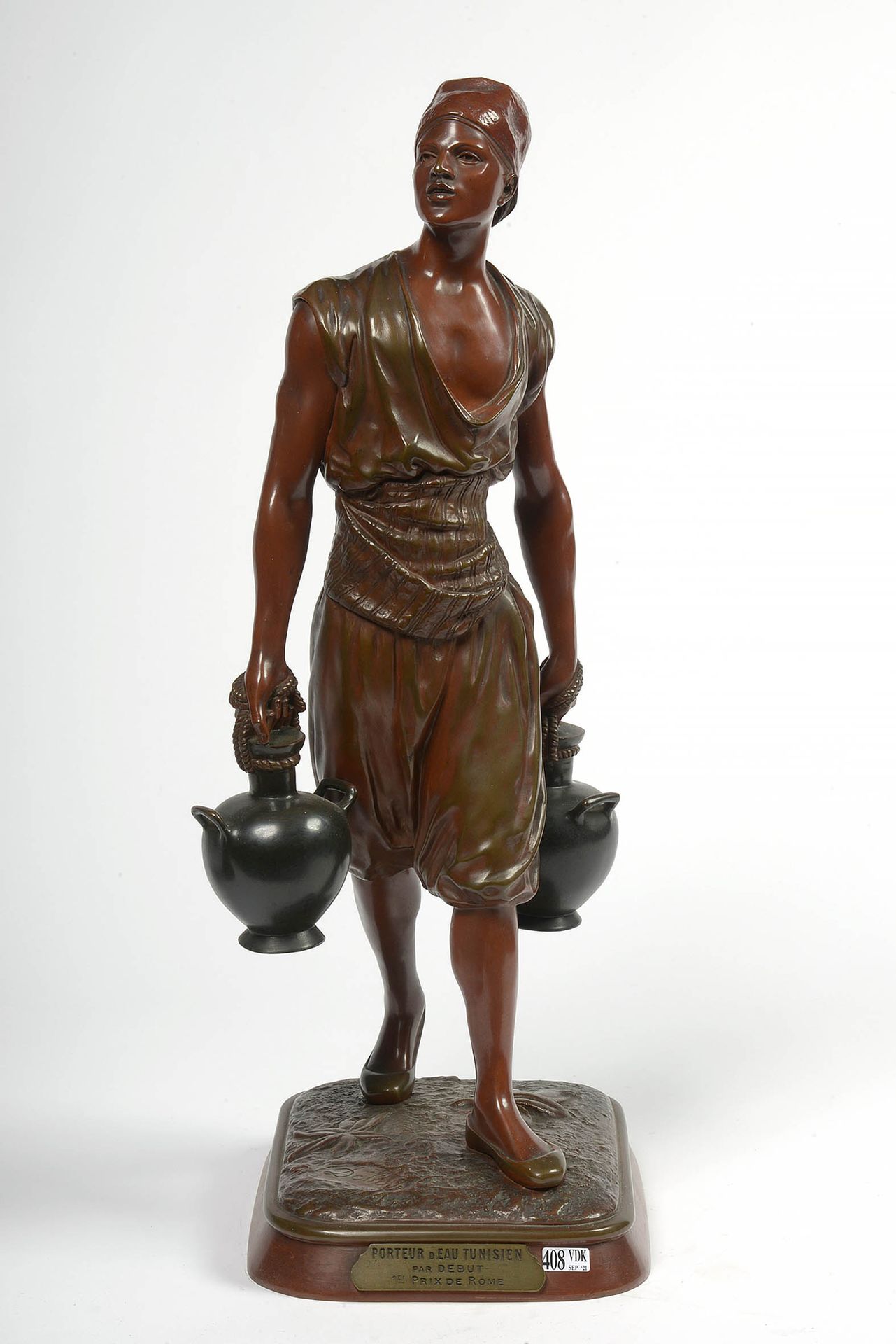 DEBUT Marcel (1865 - 1933) "Le porteur d'eau tunisien" en bronze à patine brune-&hellip;