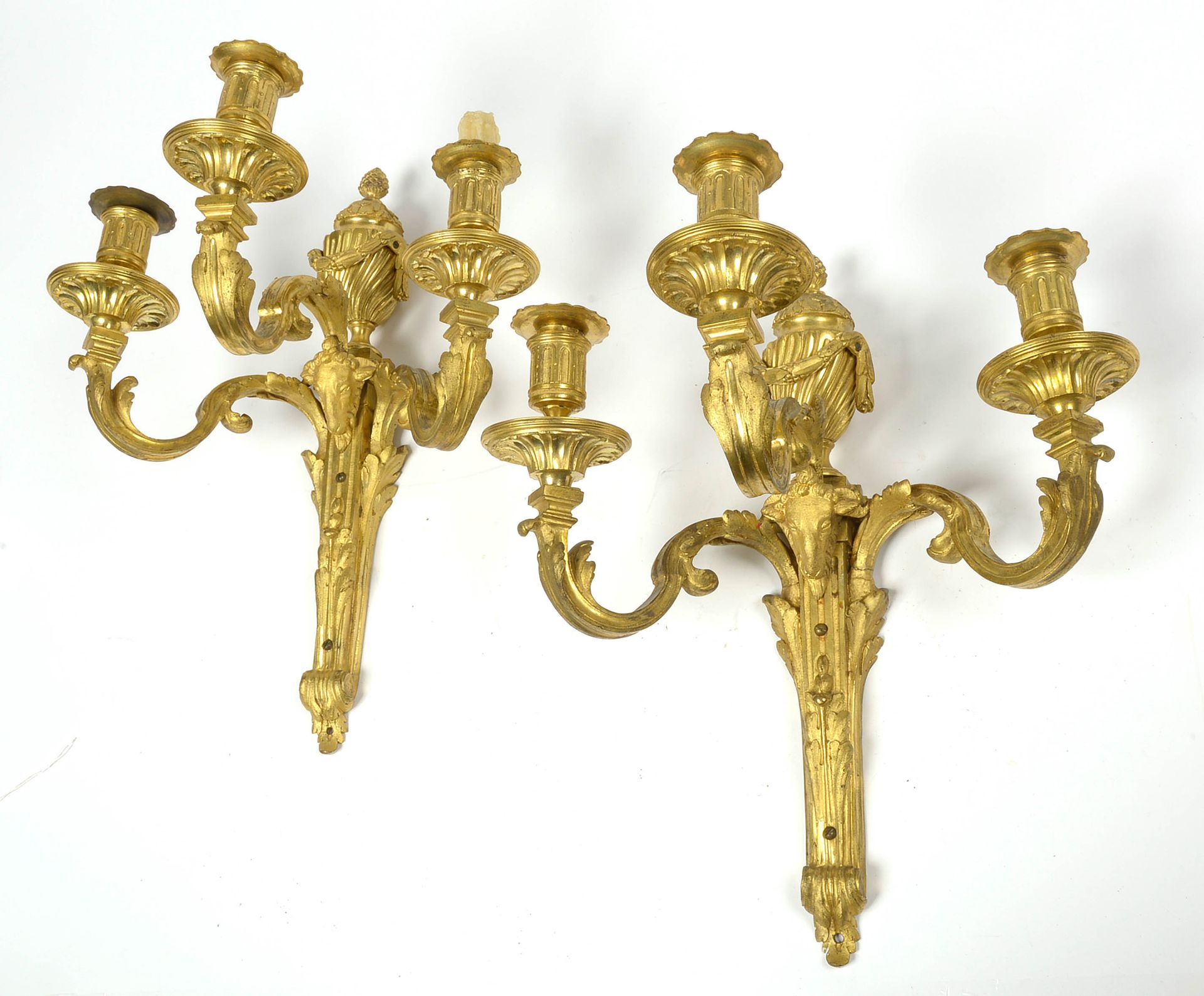 Null A pair of Louis XVI ormolu sconces with three arms of light topped by a "Po&hellip;