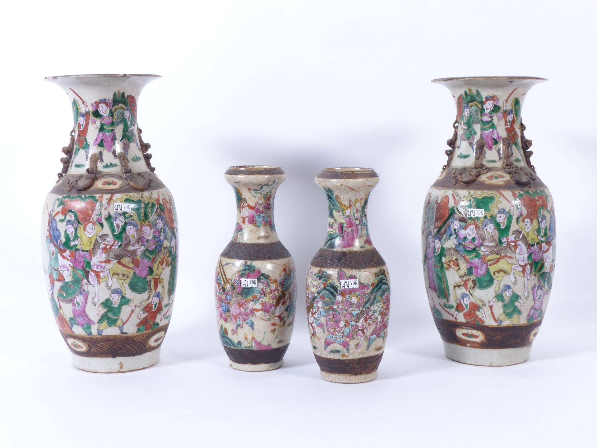 Null A pair of large Nanking earthenware vases. Two smaller ones are attached. (&hellip;