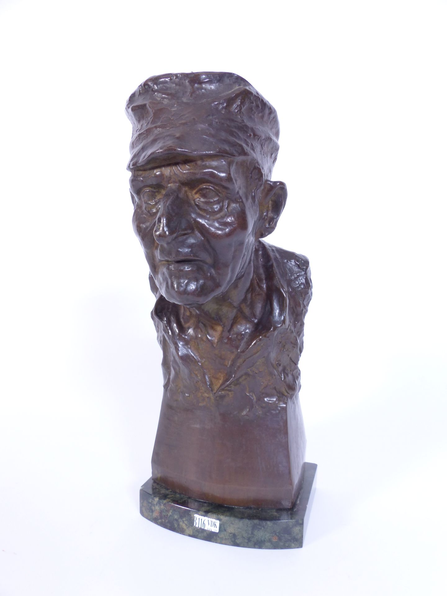 Null "Bust of a peasant" in bronze with brown patina and resting on a green marb&hellip;