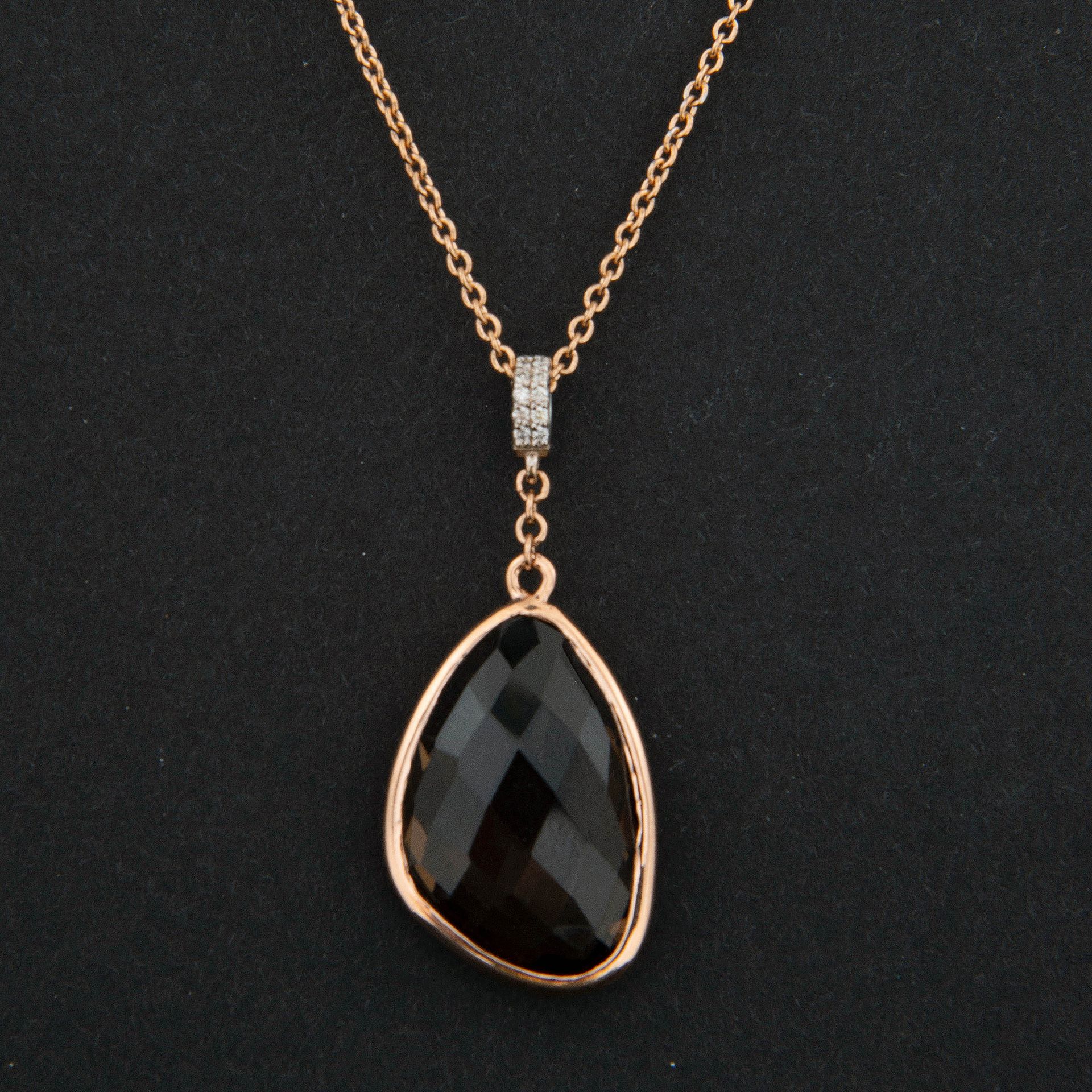 Null Chain and pendant in 18k pink gold set with smoky quartz and 0.50 carat bri&hellip;