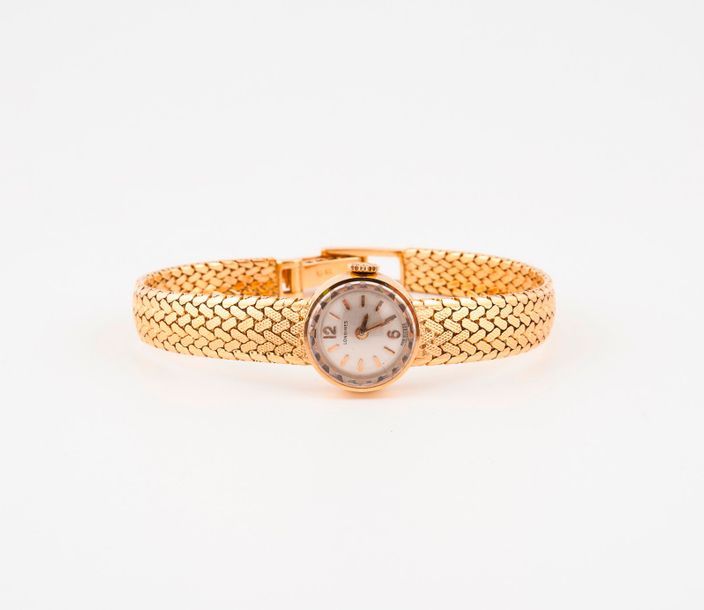 LONGINES 

Montre bracelet de dame en or jaune (750) 

Boîtier rond. 

Lunette c&hellip;