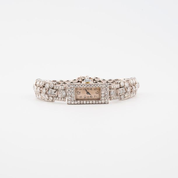 Null Montre bracelet de dame en platine (850) et or gris (750). 

Boîtier rectan&hellip;