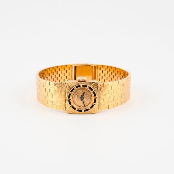 MARVIN 

Montre bracelet de dame en or jaune (750) amati. 

Boîtier carré.

Lune&hellip;