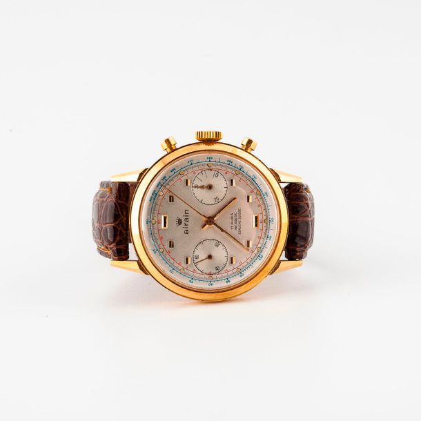 AIRAIN 

Montre chronographe bracelet d'homme. 

Boîtier rond en or jaune (750) &hellip;