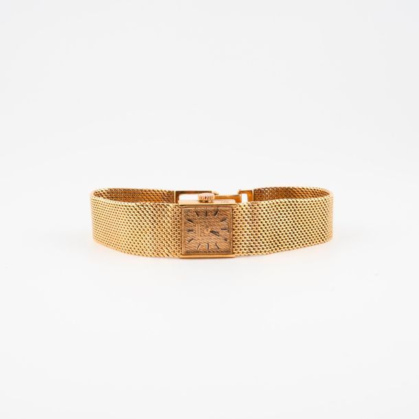 JUVENIA 

Montre bracelet de dame en or jaune (750). 

Boîtier carré. 

Fond du &hellip;