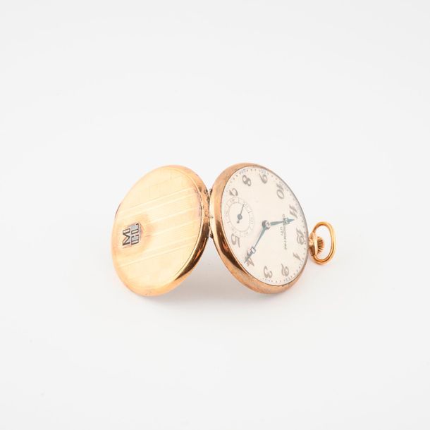 UTI 

Montre de gousset chronomètre en or jaune (750) et argent (800).

Couvercl&hellip;