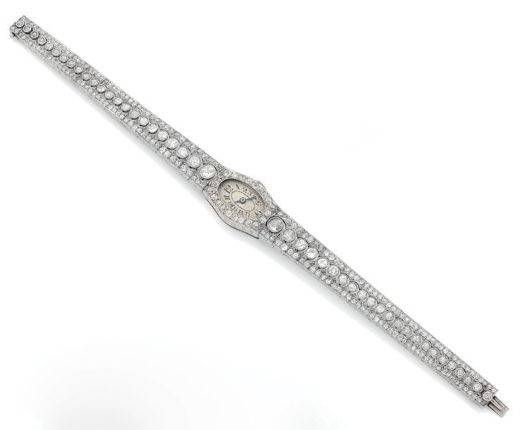 Null Montre bracelet de dame en or gris (750).
Boîtier ovale inscrit dans le bra&hellip;