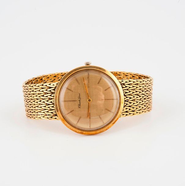 BUECHE-GIROD 

Men's bracelet watch in yellow gold (750). 

Round case. 

Engine&hellip;