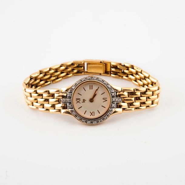 LIP 

Montre bracelet de dame en or jaune (750) 

Boîtier rond. 

Lunette ornée &hellip;