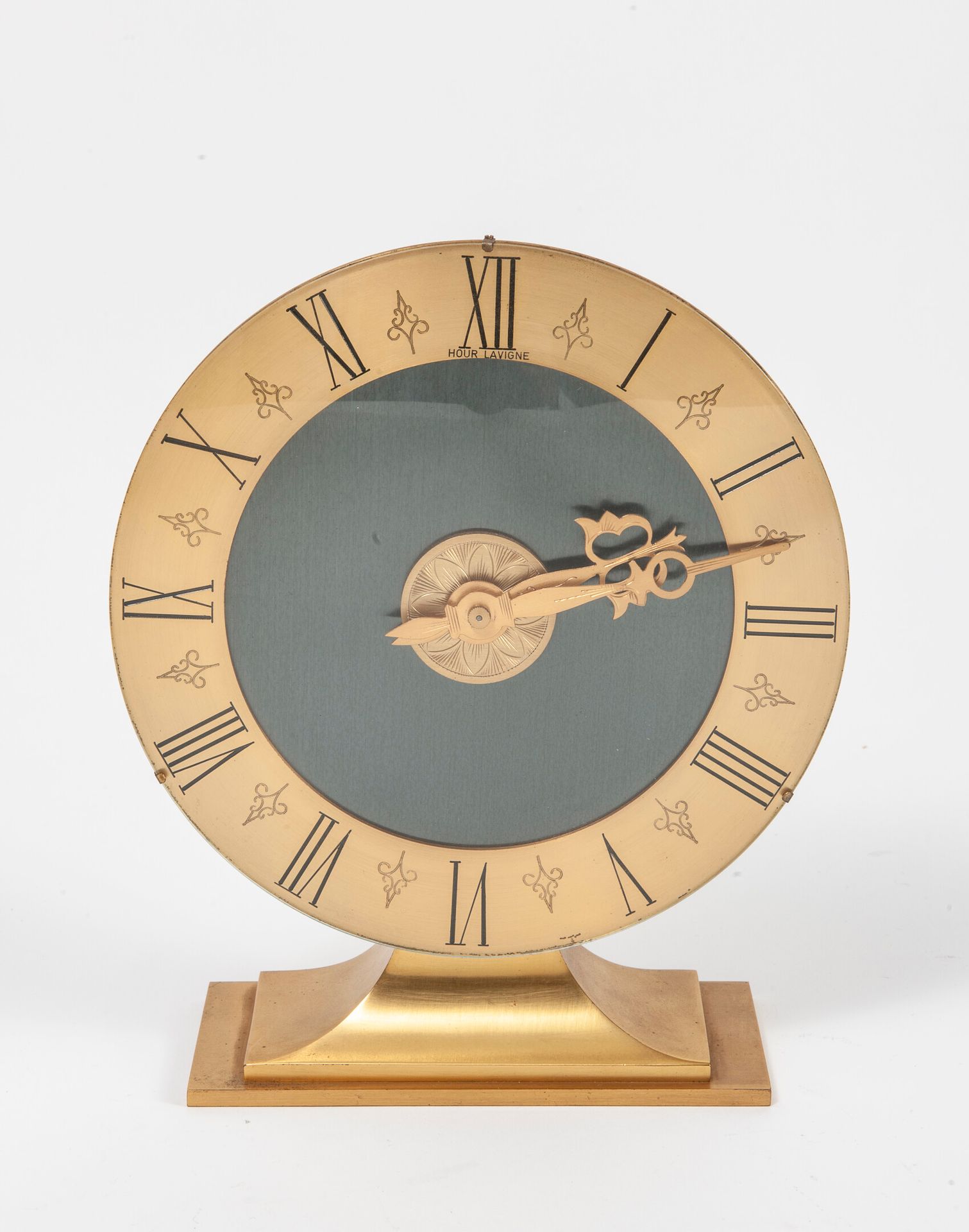 HOUR LAVIGNE Brushed brass alarm clock.

Signed annular dial with black painted &hellip;