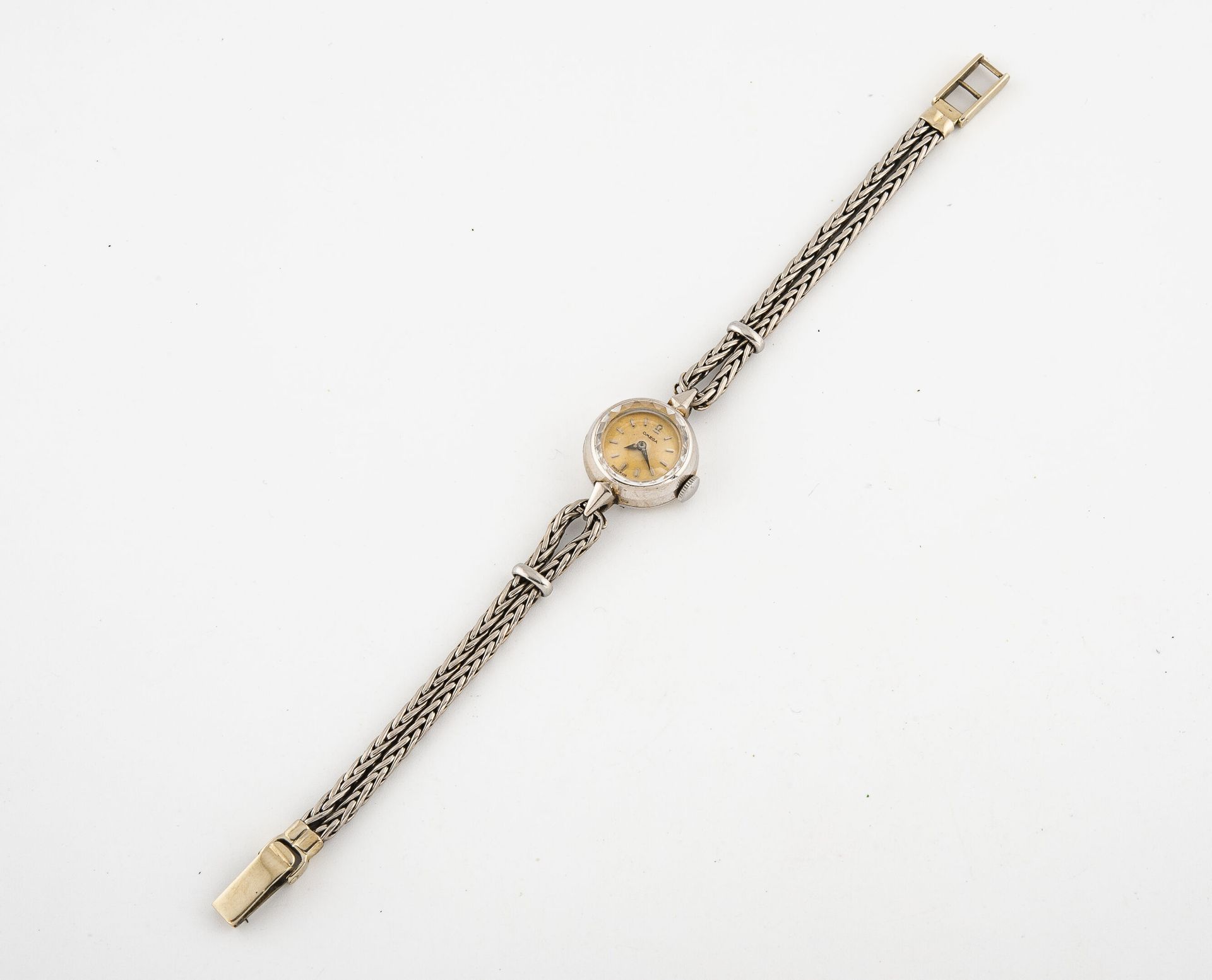 OMEGA Montre bracelet de dame en or gris (750). 

Boîtier rond.

Cadran à fond b&hellip;