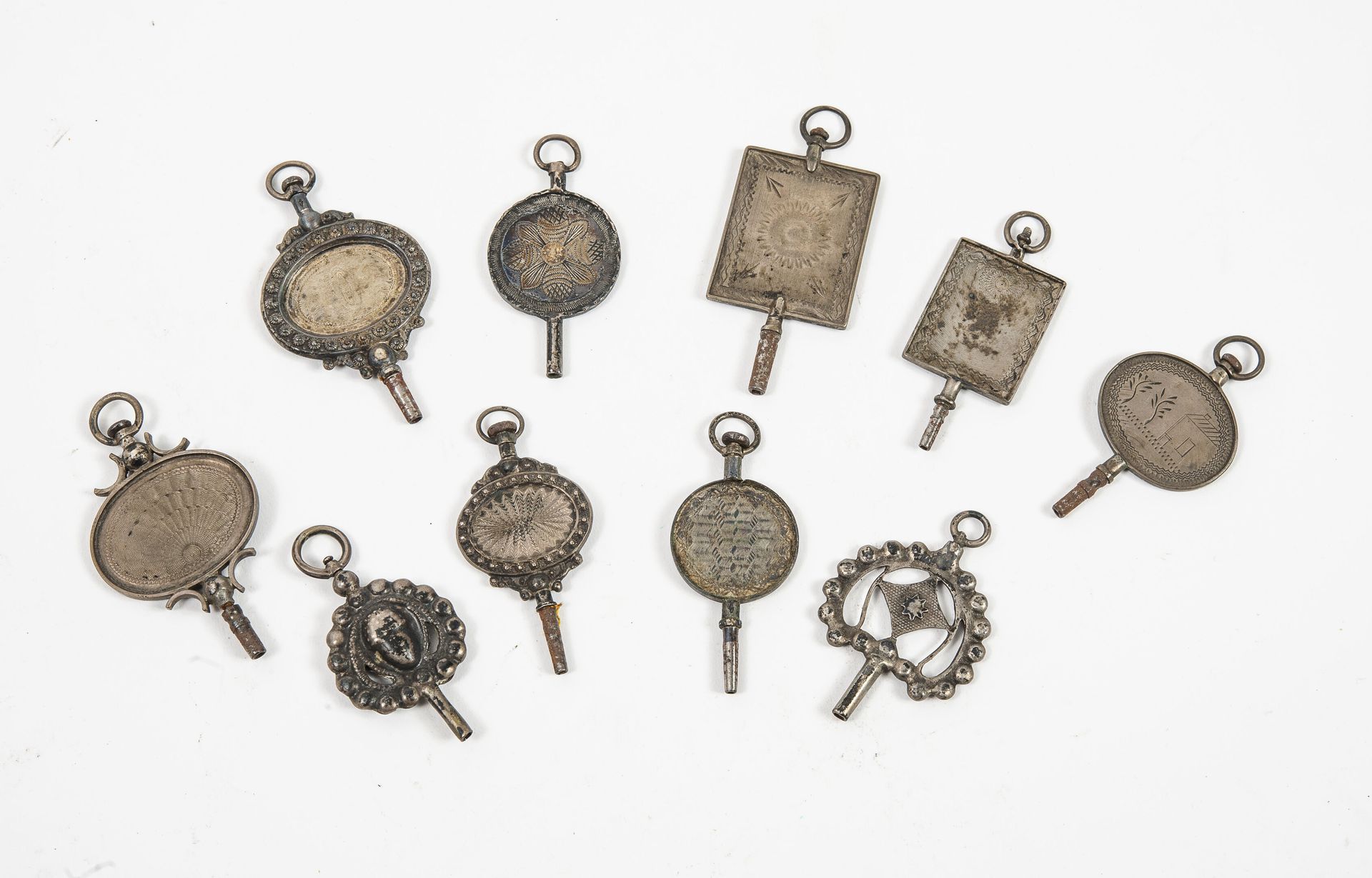 FRANCE ou PAYS BAS, XIXème siècle Ten silver (min. 800) and iron winding keys.

&hellip;