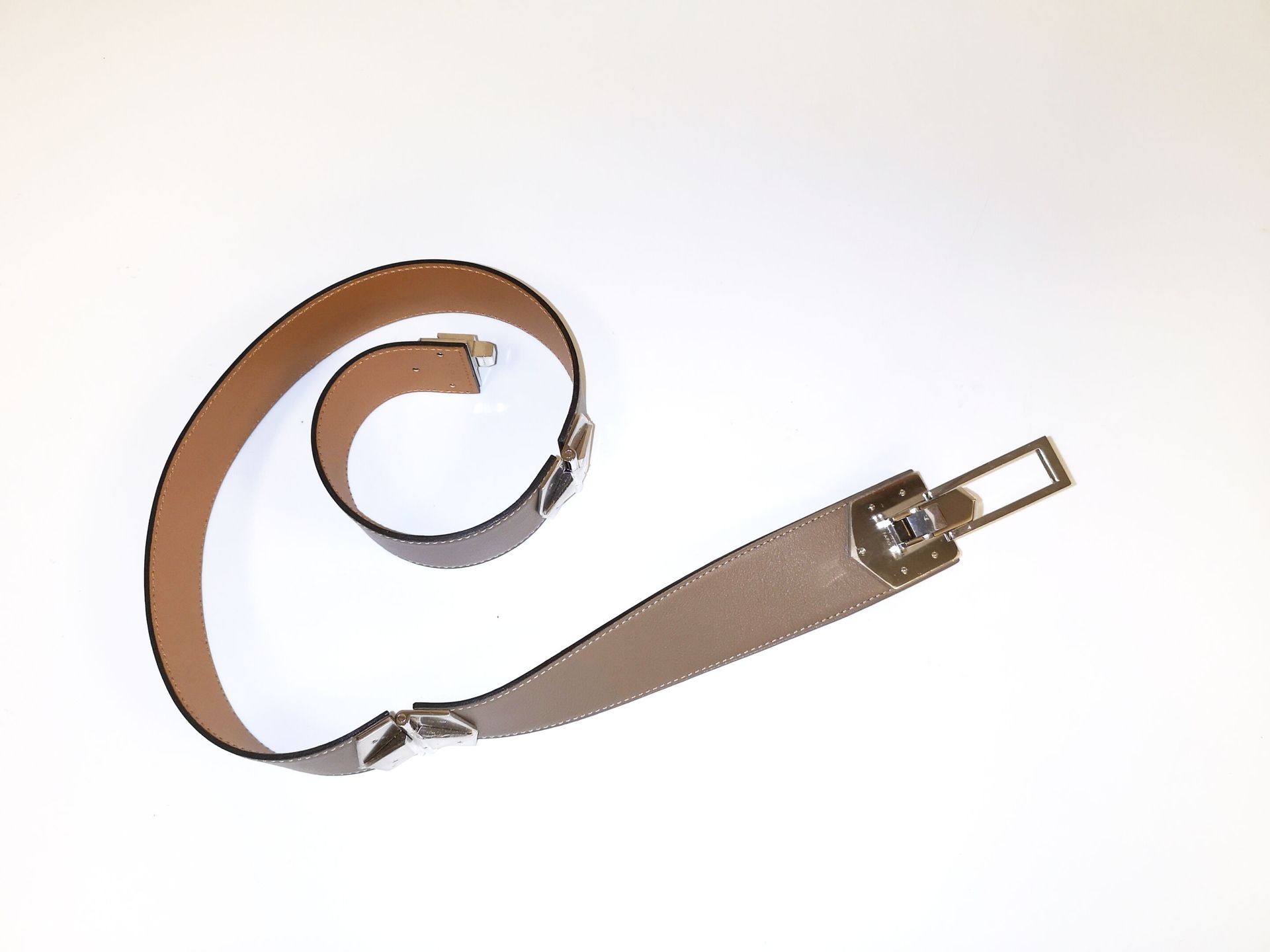 HERMES Paris, Lady's belt in smooth taupe leather with camel interior and white &hellip;