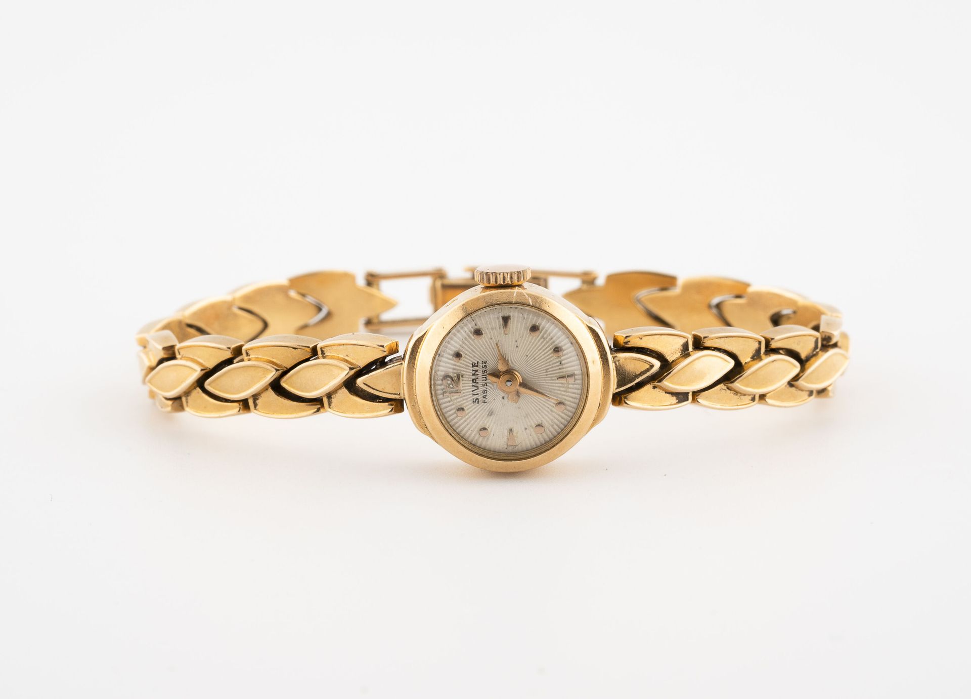 Null Montre bracelet de dame en or jaune (750).

Boîtier rond.

Cadran à fond do&hellip;