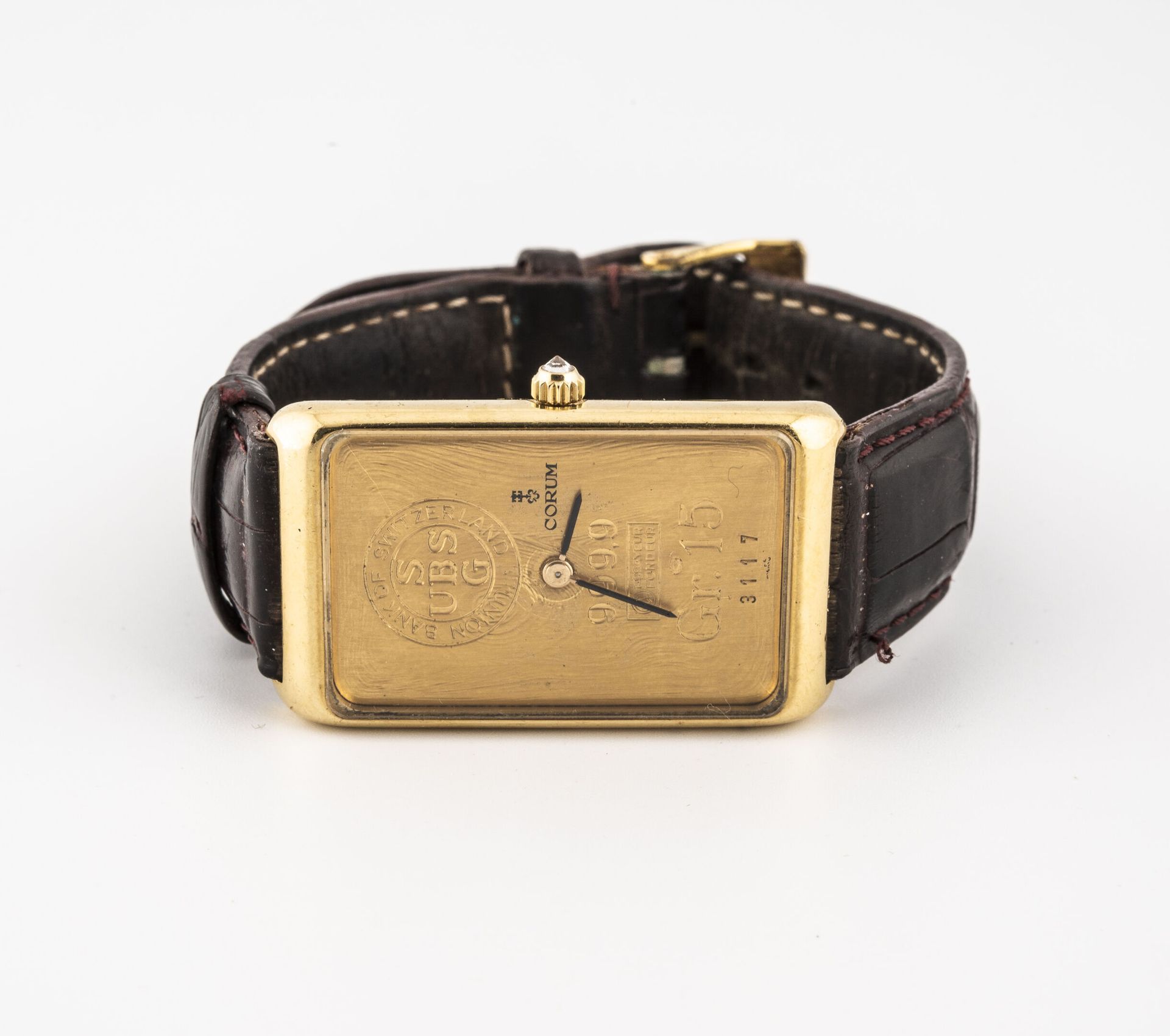 CORUM, Lingot Montre bracelet d'homme. 

Boîtier rectangulaire en or jaune (750)&hellip;