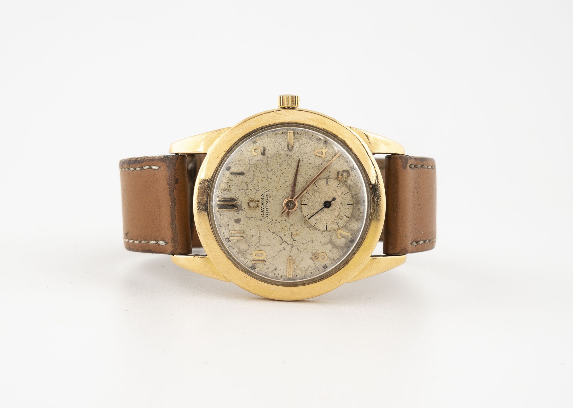 OMEGA Men's wristwatch. 

Round case in yellow gold (750).

Dial with copper bac&hellip;