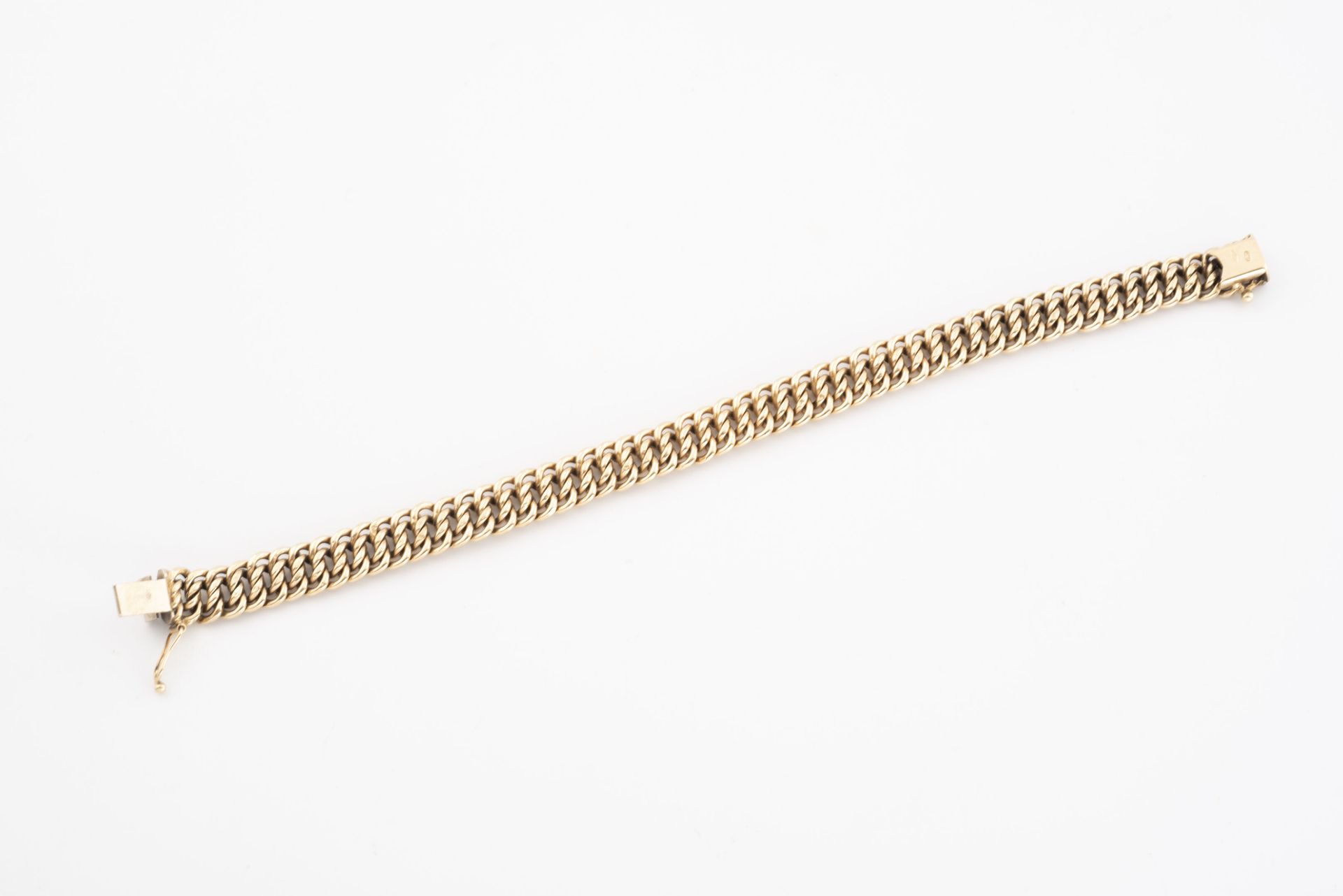 Null 黄K金（750），带美式链接，部分锉刀。

棘轮扣，有八个安全销。

重量：12.3克。- 长度：20厘米。

小震荡。