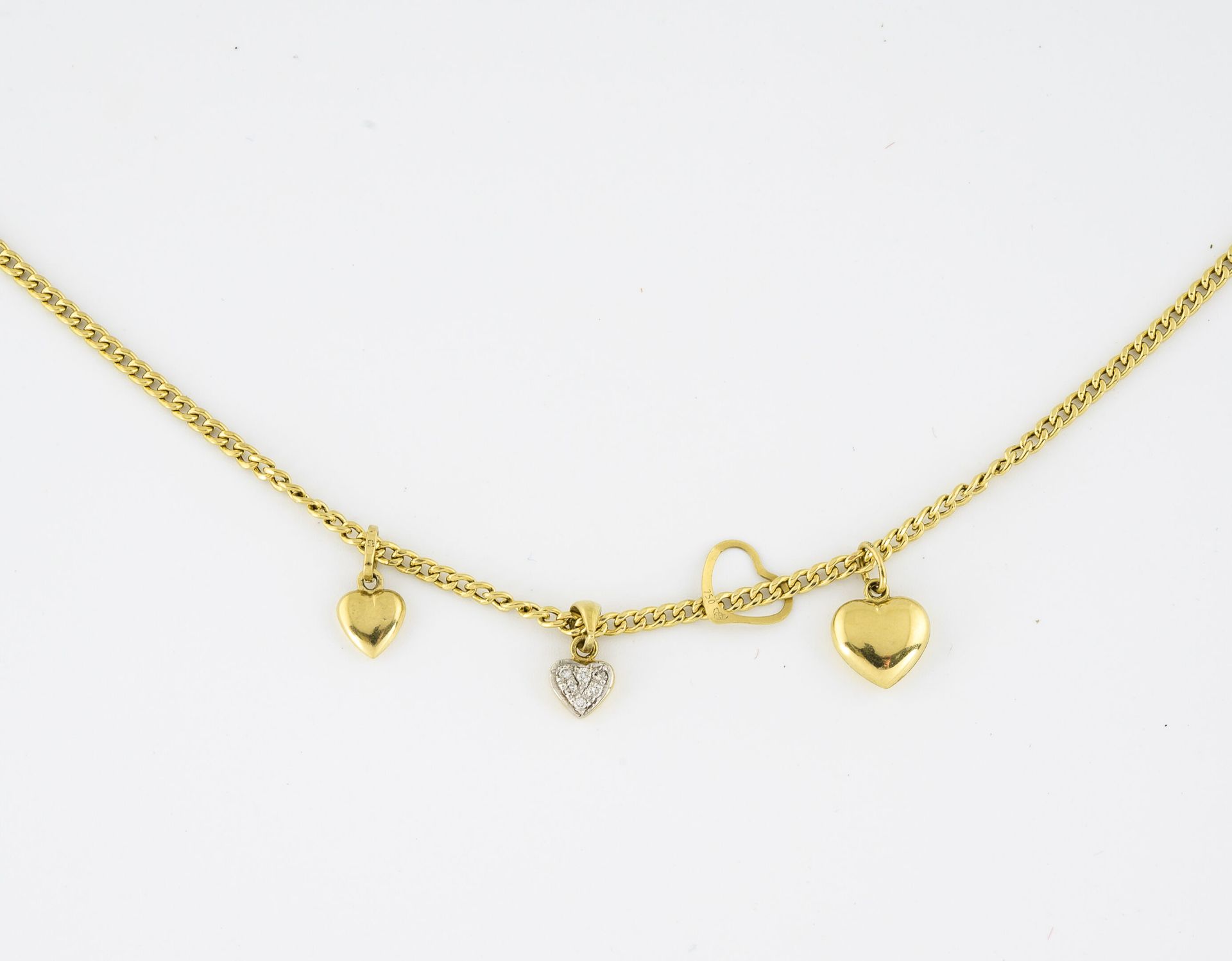 Null Yellow gold (750) necklace with curb chain. 

Snap hook clasp.

Length : 50&hellip;