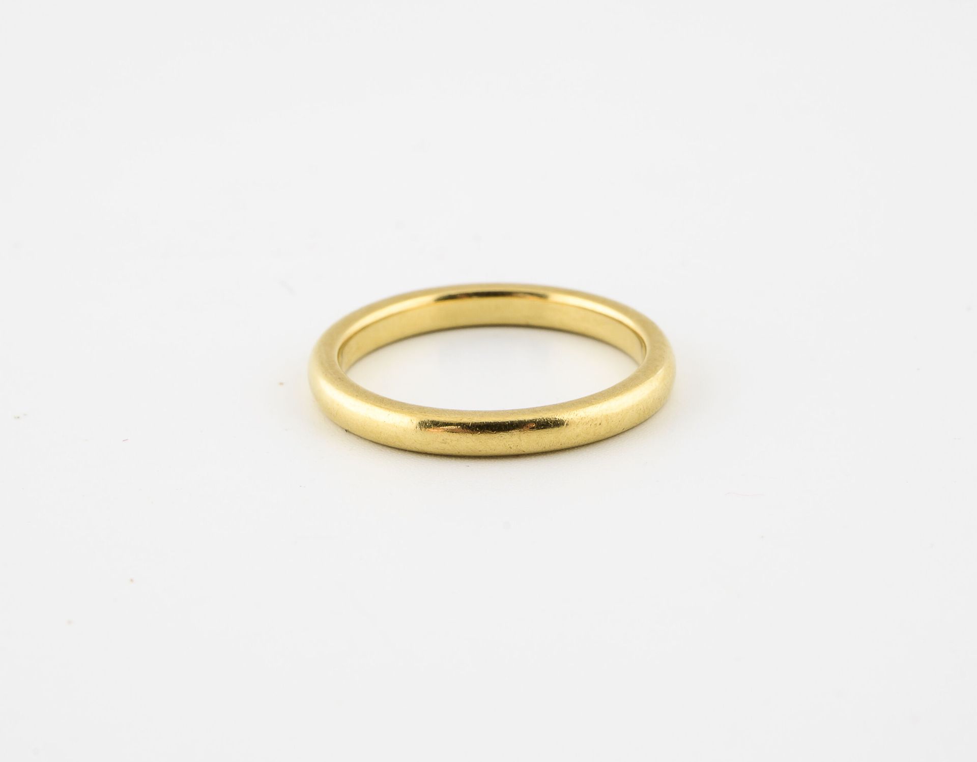 Null Wedding ring in yellow gold (750).

Weight : 4.3 g. - Finger size : 57. 

S&hellip;