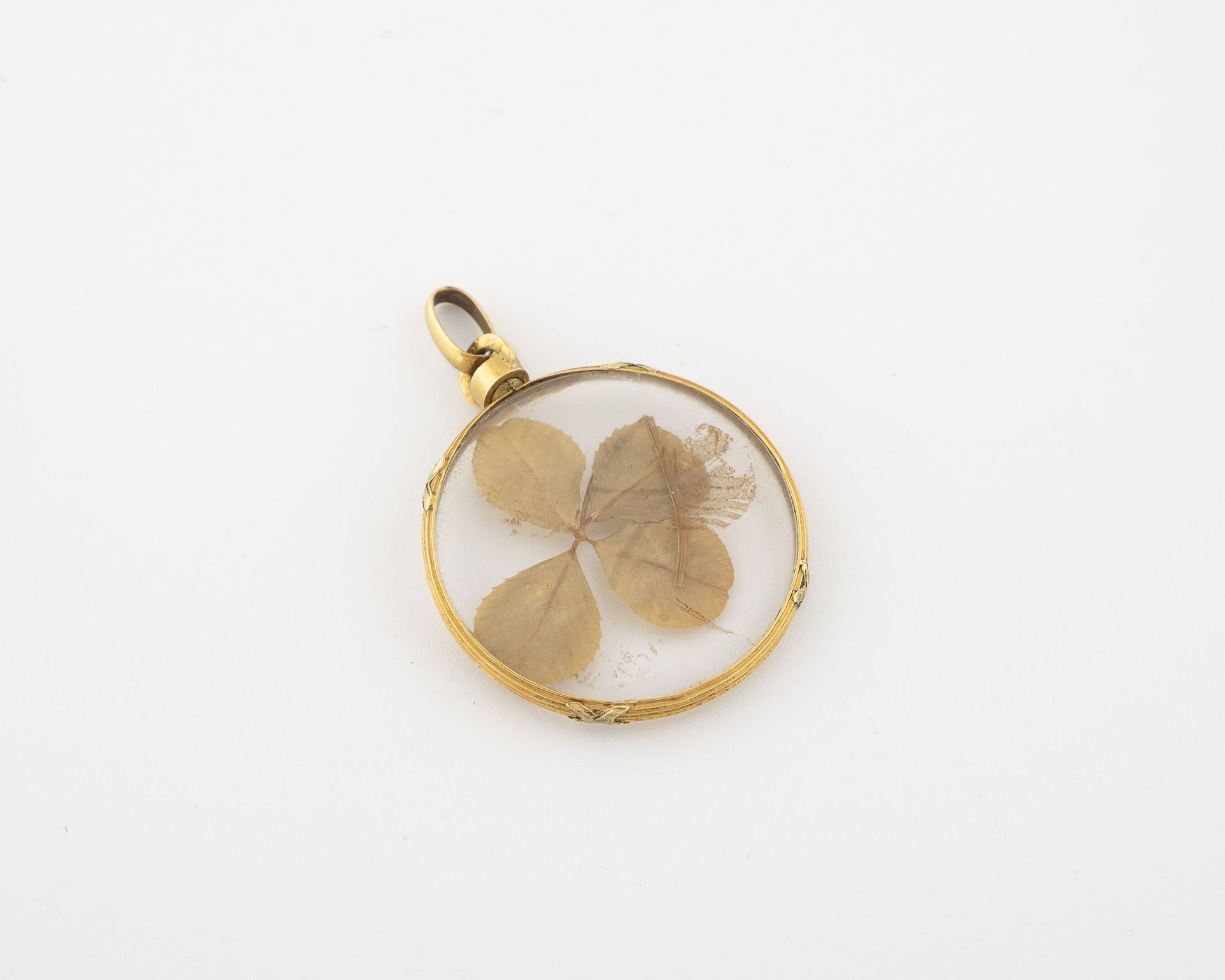Null Four-leaf clover pendant, yellow gold (750) frame.

Gross weight: 3.3 g. - &hellip;