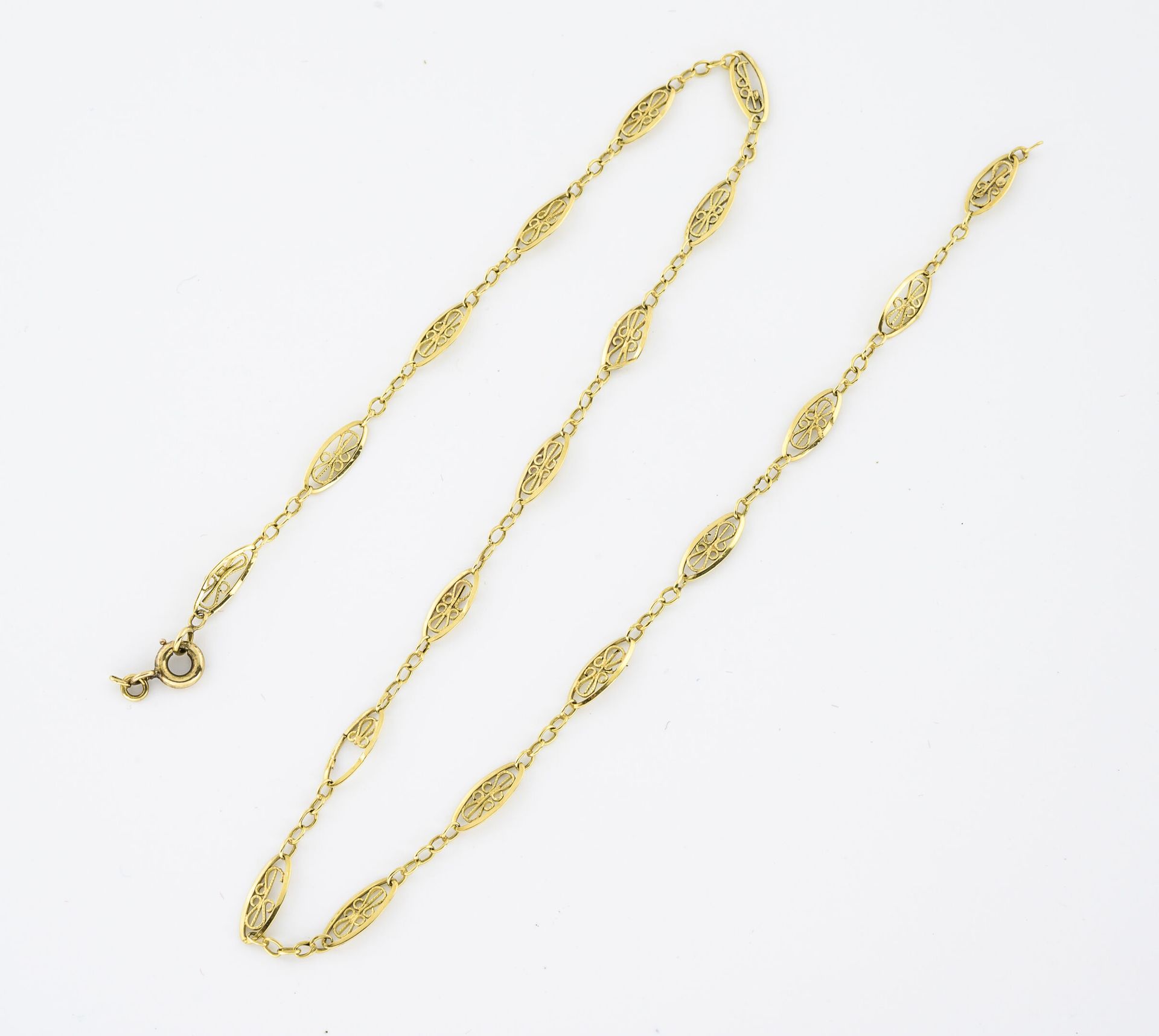 Null 黄K金（750）项链，带花纹链接。

弹簧环扣。

重量：3克。- 长度：42.5厘米。

事故。