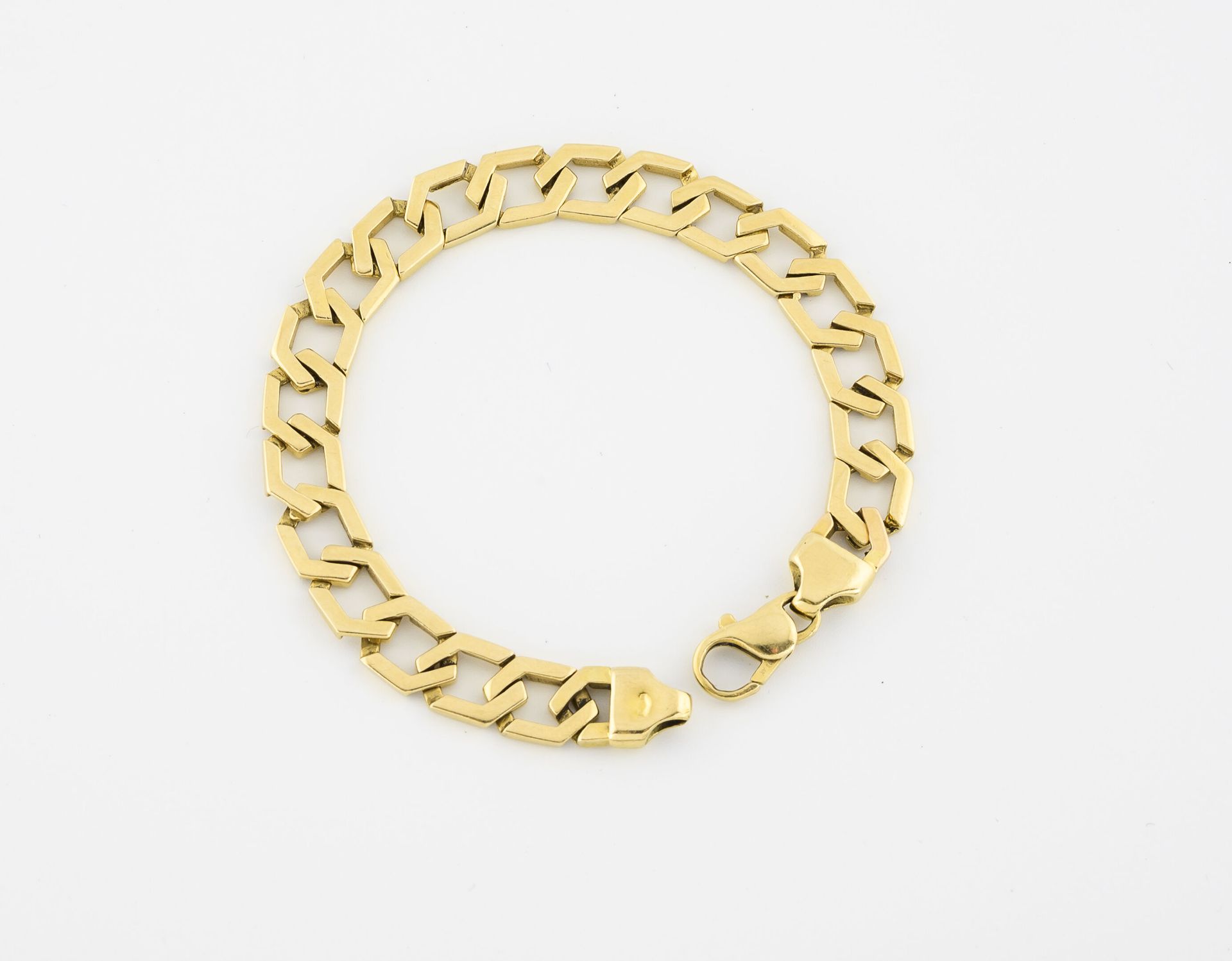 Null Yellow gold (750) bracelet with articulated hexagonal links. 

Clasp.

Weig&hellip;