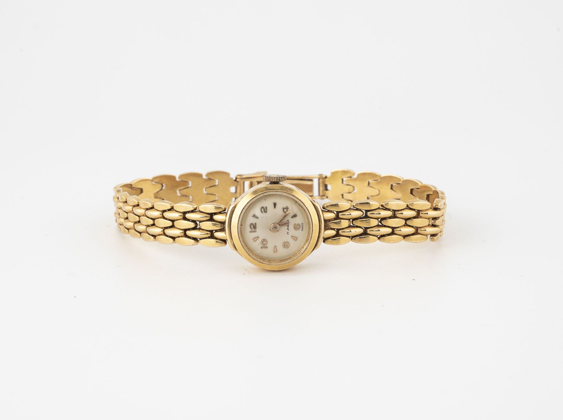 Null Montre bracelet de dame en or jaune (750).

Boîtier rond.

Cadran à fond sa&hellip;