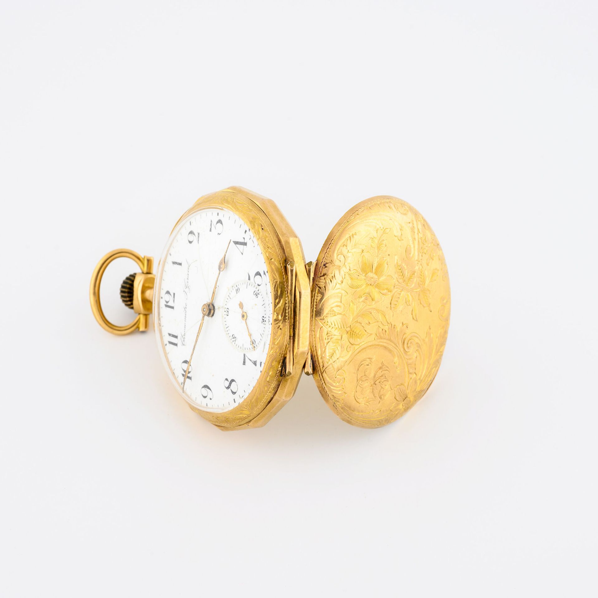 Chronomètre J.GARAVEL 黄金（750）怀表。

封底有凿花装饰。

白色珐琅表盘，有签名，阿拉伯数字代表小时，轨道代表分钟。

秒针位于6点&hellip;