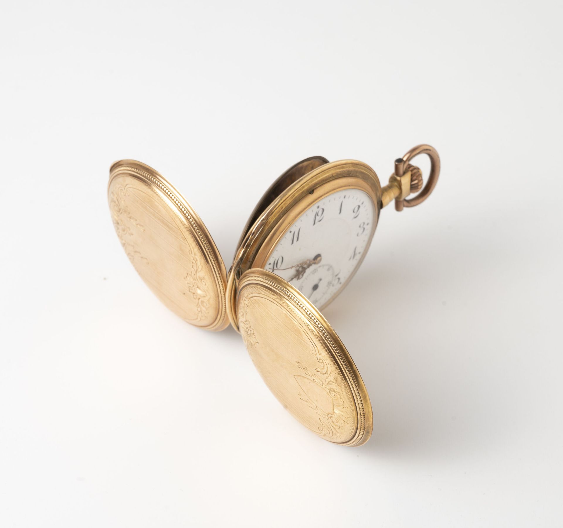 Null Reloj de bolsillo de oro amarillo (585).

Contraportada y portada decoradas&hellip;
