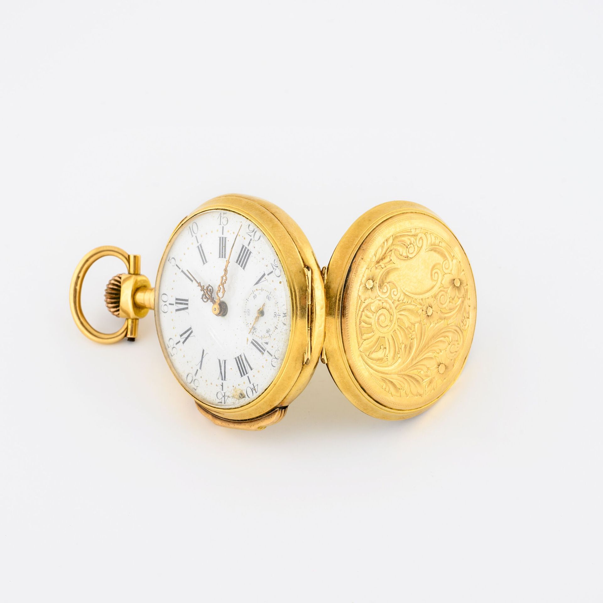 Null Yellow gold (750) pocket watch.

Back cover with chased flowers. 

White en&hellip;