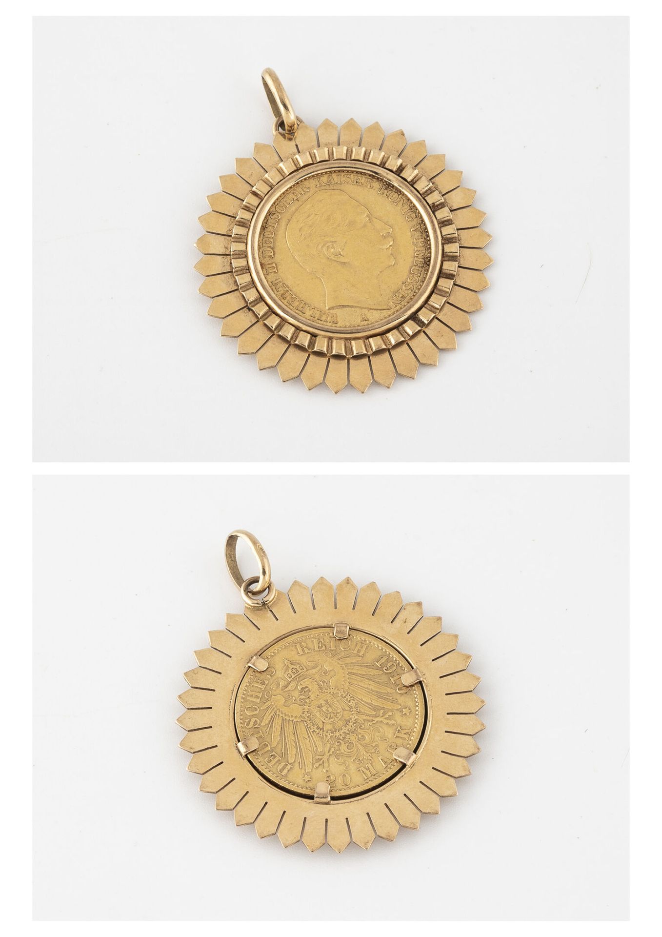 Null 黄金（750）吊坠，手持20马克硬币，威廉二世；1910年。

重量：15.1克。- 迪姆。3.7厘米。 

因使用而产生的划痕。