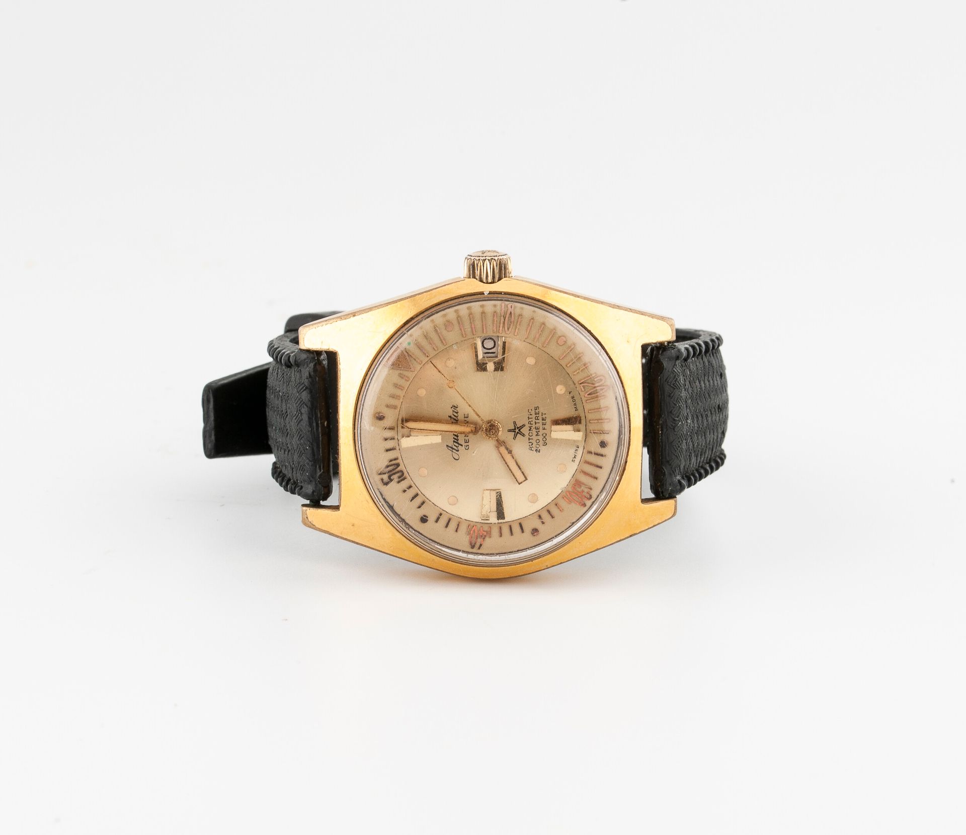 AQUASTER Genève, Diver 63 Men's wrist watch.

Steel and gilded metal barrel case&hellip;
