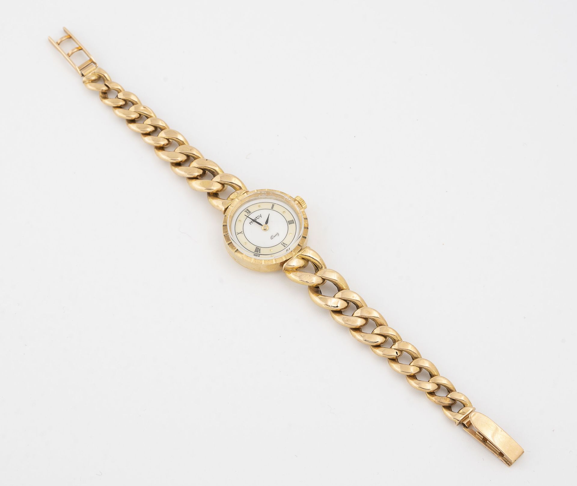 MATY Lady's wristwatch in yellow gold (750).

Round case.

Dial with white backg&hellip;