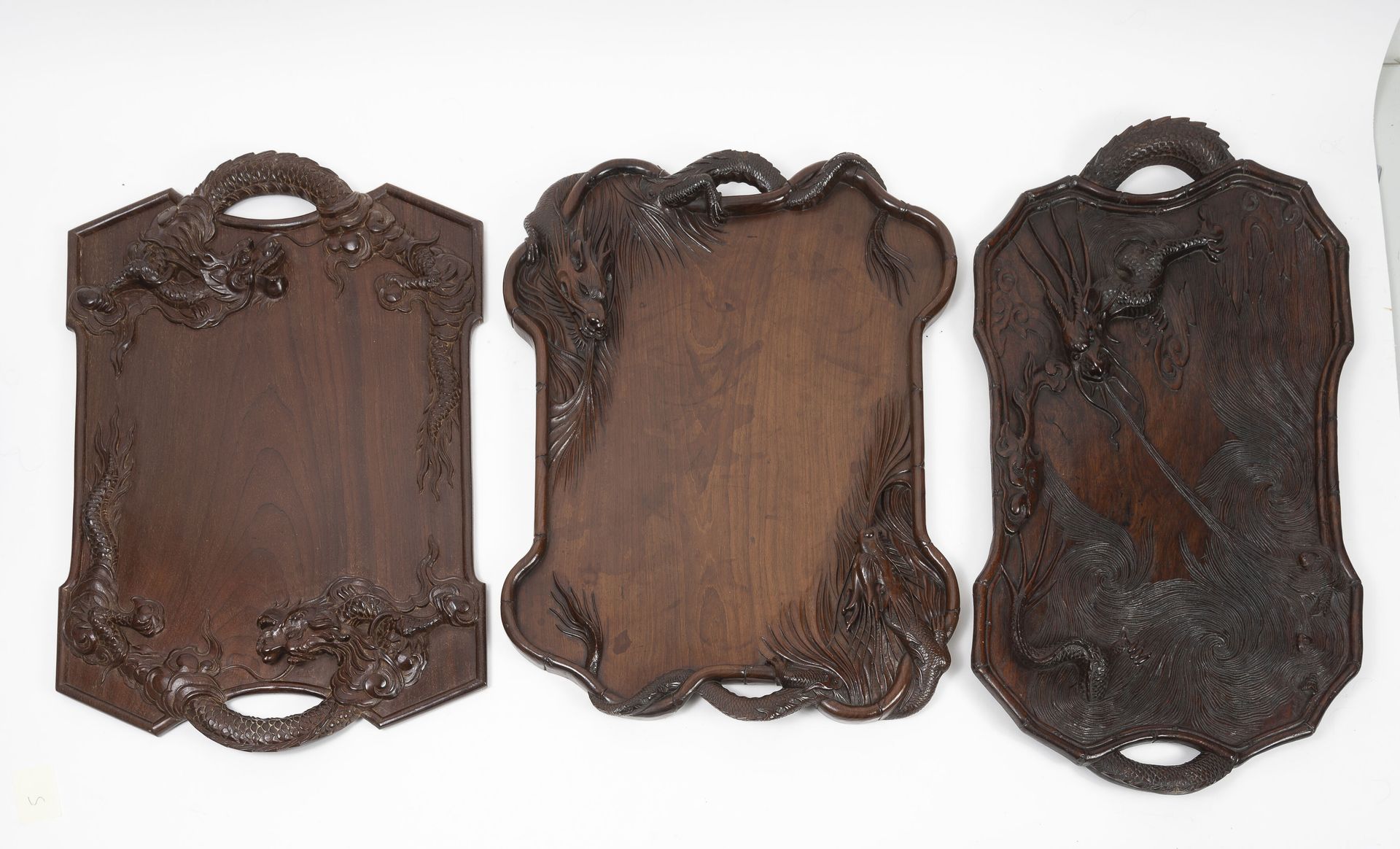 INDOCHINE, fin XIXème-début du XXème siècle Three trays in exotic wood carved wi&hellip;