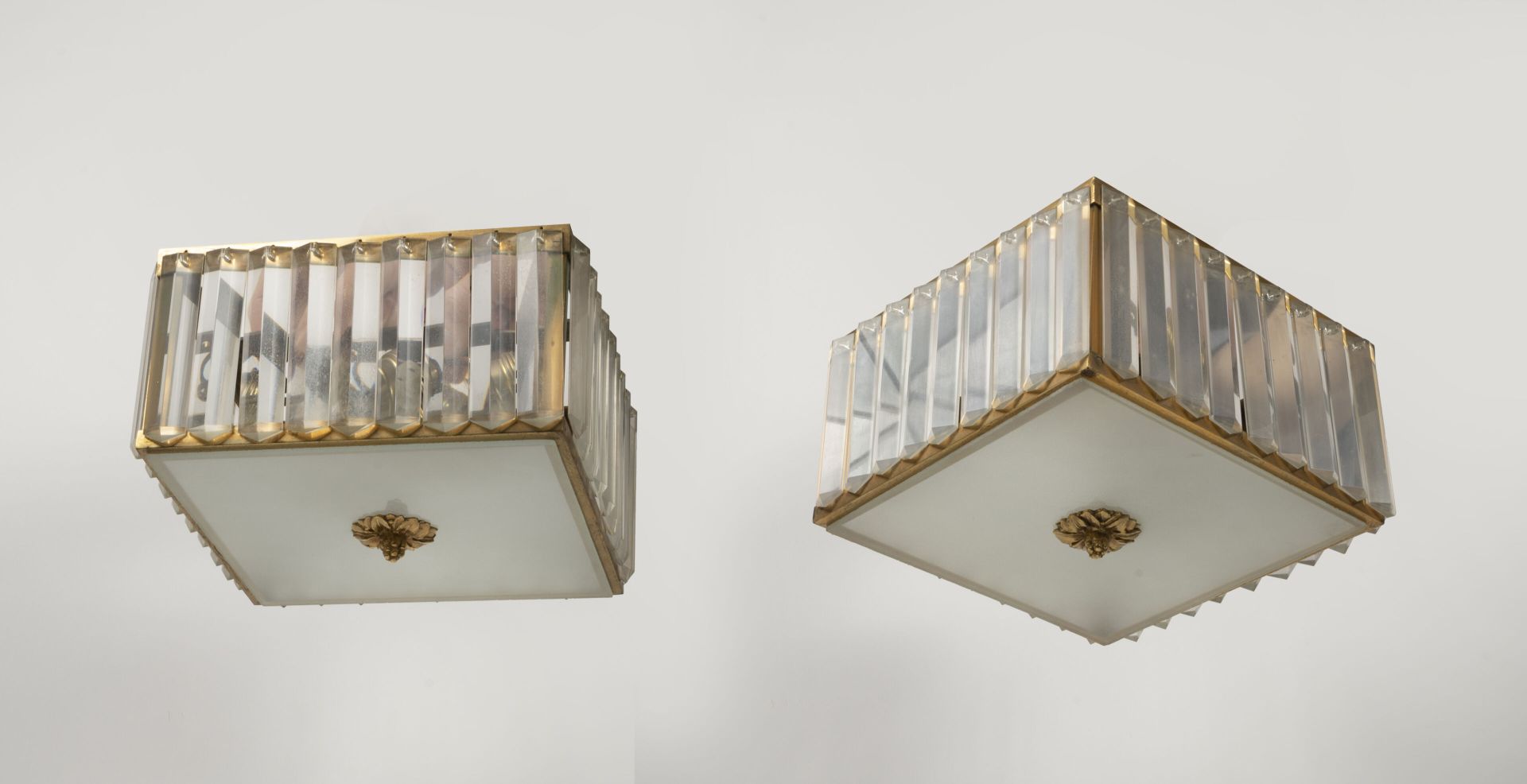 Null Two ceiling lights of square form.

Cage mount with brass angle iron plate &hellip;