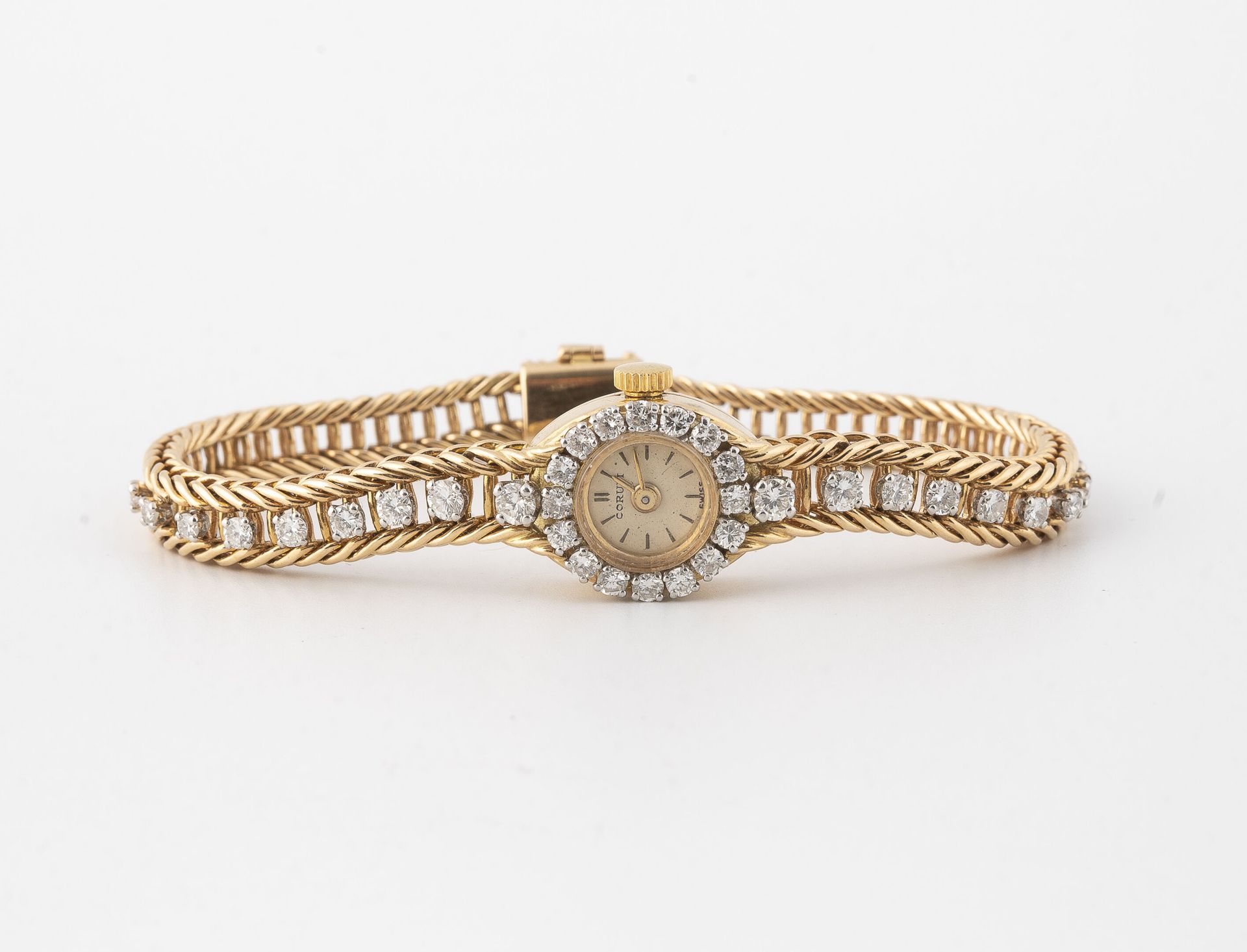 CORUM Montre bracelet de dame en or jaune (750) et platine (950).

Boîtier rond,&hellip;