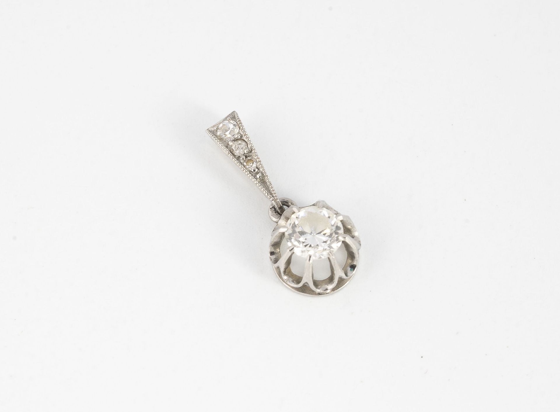 Null Platinum (850) pendant set with a small old-cut diamond in claw setting, th&hellip;