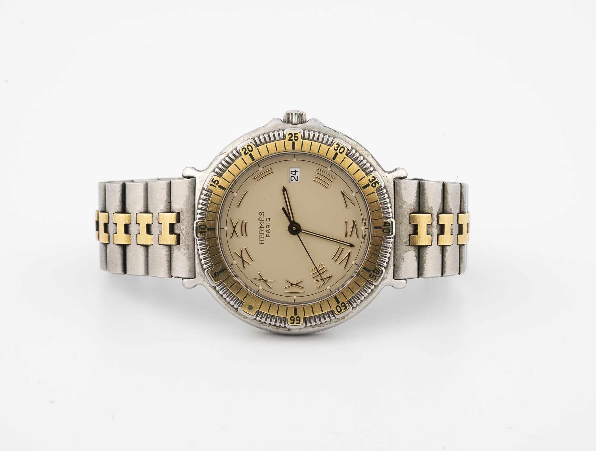 HERMES Paris Reloj de pulsera para hombre en acero y metal dorado.

Caja redonda&hellip;