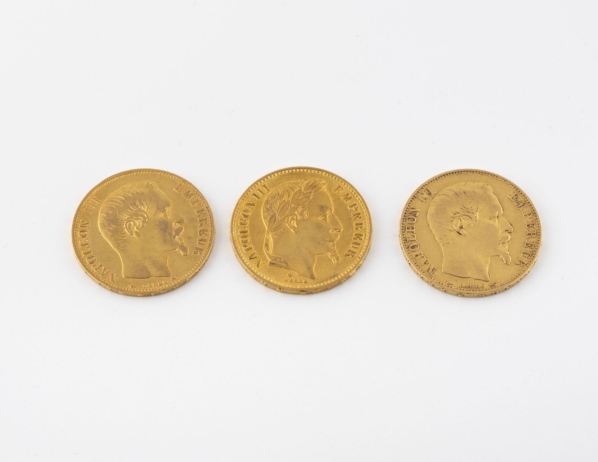 FRANCE 3枚20法郎金币。
两枚1854年的硬币和一枚1869年的硬币。拿破仑三世。 
总重量：19,2克。