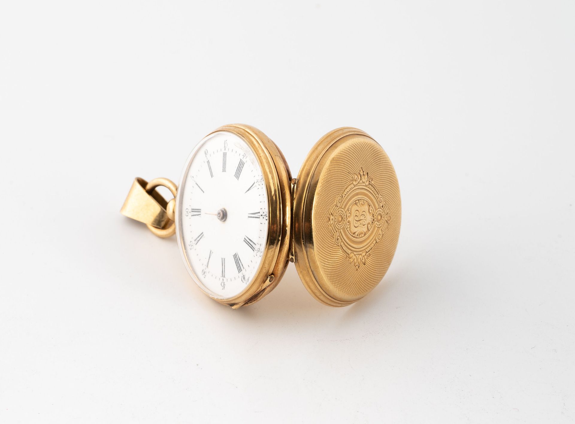 Null Pocket watch in yellow gold (750).
Back cover decorated with a J.G. Numeral&hellip;