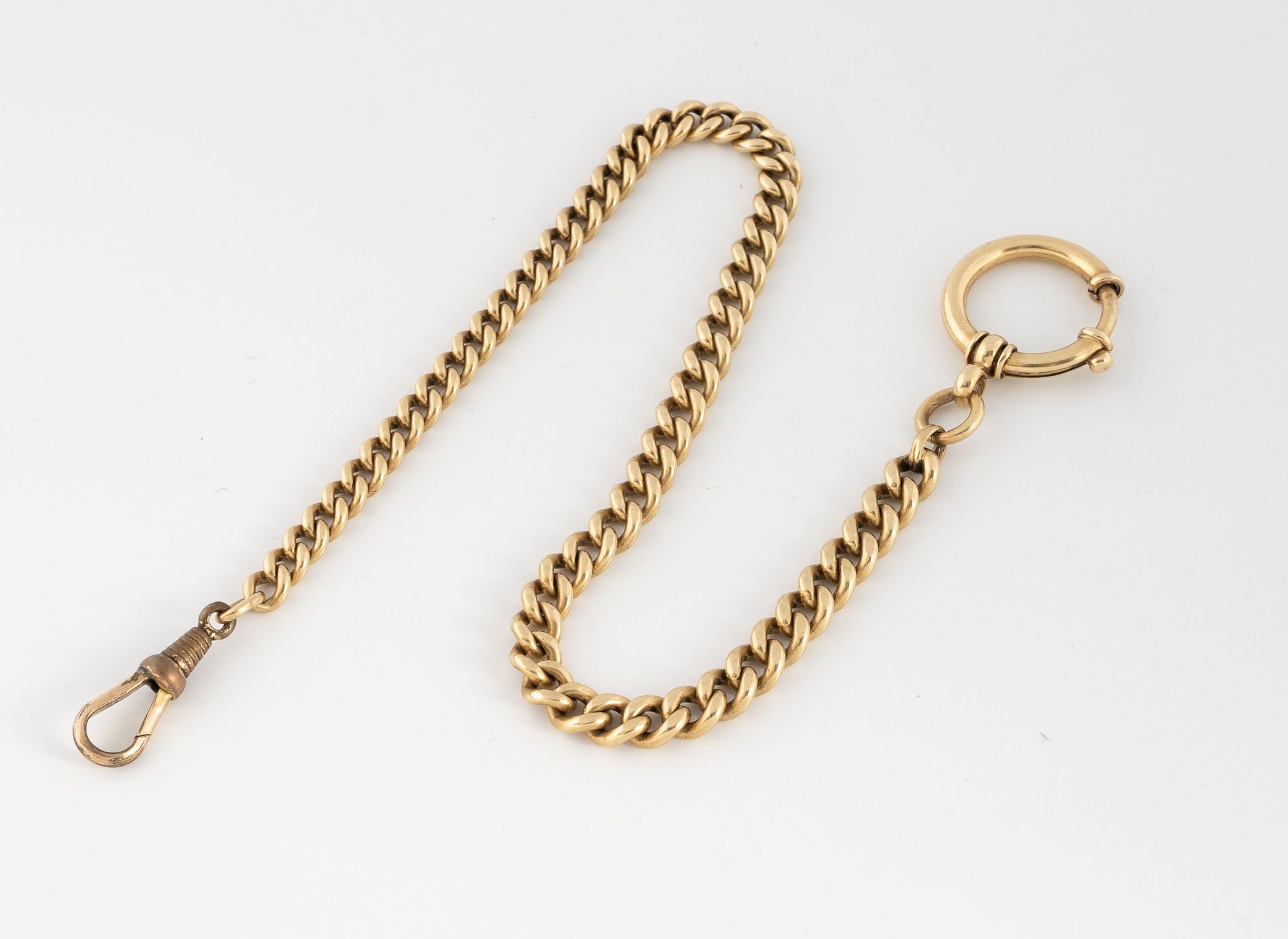 Null 黄金(585)表链，带路牙链。
长24厘米 - 重量：26.7克。
有划痕。