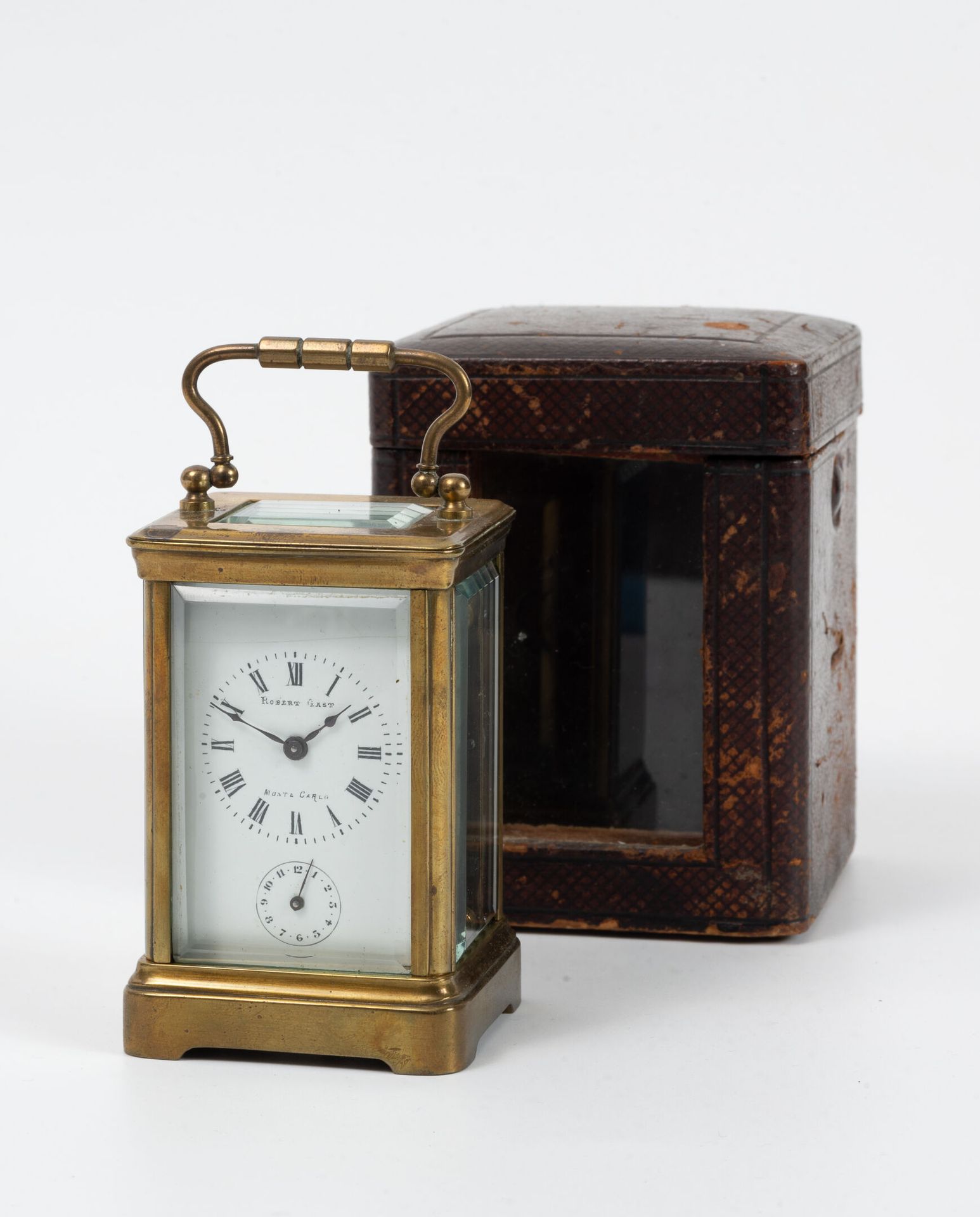 Robert GAST Officer's clock in gilt metal. 
Rectangular cage on plinth with four&hellip;