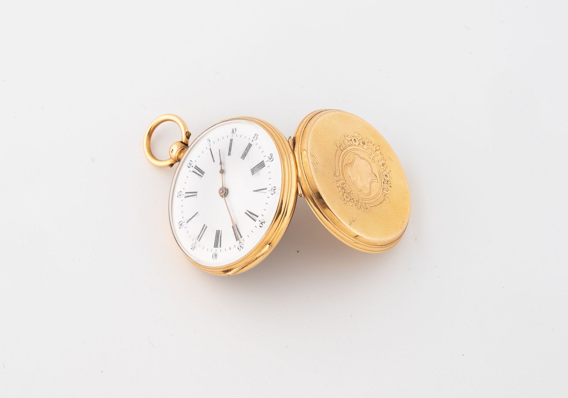 Null Taschenuhr aus Gelbgold (750).
Hinterer Deckel mit einer Kartusche in einer&hellip;